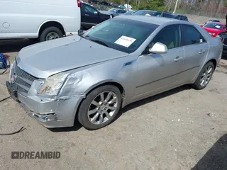 2008 Cadillac CTS RWD w/1SB with VIN 1G6DV57V380138406, listed as a IAAI auction lot 42048658 with 125,923 mi miles. Bid and sale history available at carsss.com. Image 2.