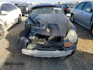 2000 Porsche Boxster z VIN WP0CA2984YU627674, wystawiony jako Copart lot #86027054 z przebiegiem 112 153 mil mil oraz Szkoda całkowita • Salvage title. Historia ofert i sprzedaży dostępna na DreamBid. Obrazek 5.