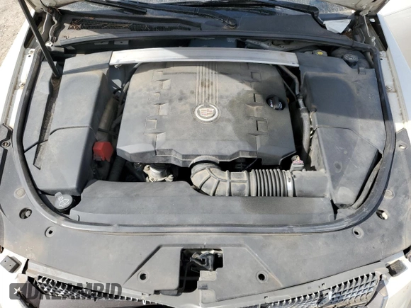 2010 Cadillac CTS Luxury z VIN 1G6DE5EG9A0104691, wystawiony jako Copart lot #50609575 z przebiegiem 151 849 mil mil oraz Szkoda całkowita • Salvage title. Historia ofert i sprzedaży dostępna na DreamBid. Obrazek 13.