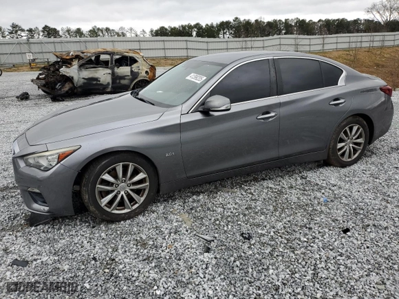 2018 Infiniti Q50 2.0t PURE with VIN JN1CV7APXJM240057, listed as a Copart auction lot 41399205 with 105,974 mi miles and Salvage Title. Bid and sale history available at carsss.com. Image 1.