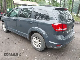 2018 Dodge Journey SXT z VIN 3C4PDCBB7JT409958, wystawiony jako IAAI lot #42200397 z przebiegiem 146 306 mil mil oraz . Historia ofert i sprzedaży dostępna na DreamBid. Obrazek 3.