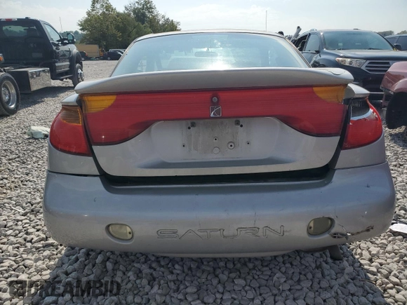 2001 Saturn SC z VIN 1G8ZR12711Z109068, wystawiony jako Copart lot #72353914 z przebiegiem 116 559 mil mil oraz Szkody całkowita. Historia ofert i sprzedaży dostępna na DreamBid. Obrazek 6.