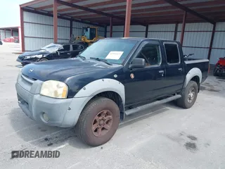 2003 Nissan Frontier XE z VIN 1N6ED27T13C444266, wystawiony jako IAAI lot #42365423 z przebiegiem 245 641 mil mil oraz . Historia ofert i sprzedaży dostępna na DreamBid. Obrazek 2.