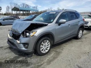2014 Mazda CX-5 Touring with VIN JM3KE4CY1E0365787, listed as a Copart auction lot 49103355 with 144,031 mi miles and Salvage Title. Bid and sale history available at carsss.com. Image 1.