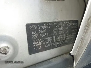 2004 Hyundai Santa Fe GLS with VIN KM8SC13DX4U592070, listed as a IAAI auction lot 42030363 with 296,823 mi miles. Bid and sale history available at carsss.com. Image 9.