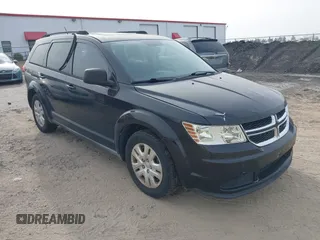 2013 Dodge Journey SE with VIN 3C4PDCAB0DT702977, listed as a IAAI auction lot 41797817 with 150,317 mi miles. Bid and sale history available at carsss.com. Image 1.