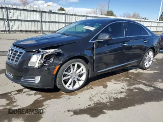 2013 Cadillac XTS Premium z VIN 2G61S5S31D9143587, wystawiony jako Copart lot #47389775 z przebiegiem 82 838 mil mil oraz Szkody całkowita. Historia ofert i sprzedaży dostępna na DreamBid. Obrazek 1.