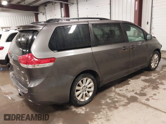 2011 Toyota Sienna LE with VIN 5TDJK3DC2BS013045, listed as a IAAI auction lot 41127037 with 239,401 mi miles. Bid and sale history available at carsss.com. Image 4.