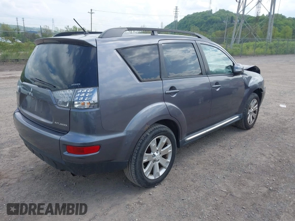 2010 Mitsubishi Outlander z VIN JA4AT3AW9AZ016348, wystawiony jako IAAI lot #42219377 z przebiegiem 104 414 mil mil oraz . Historia ofert i sprzedaży dostępna na DreamBid. Obrazek 4.
