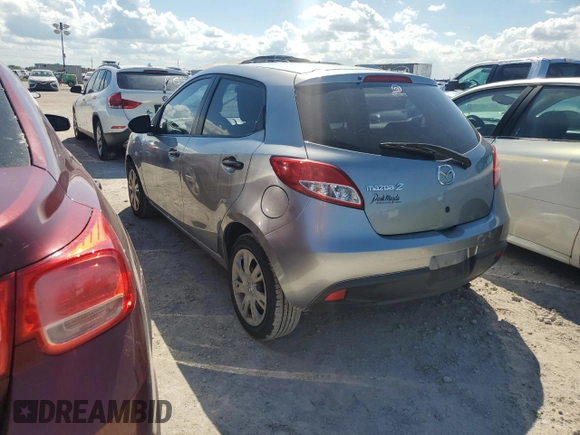 2014 Mazda 2 Sport with VIN JM1DE1KY6E0189739, listed as a Copart auction lot 76468914 with 107,164 mi miles and Salvage Title. Bid and sale history available at carsss.com. Image 2.