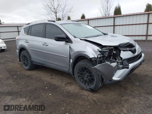 2018 Toyota RAV4 LE with VIN 2T3BFREV9JW724606, listed as a IAAI auction lot 41862028 with 98,590 mi miles. Bid and sale history available at carsss.com. Image 1.