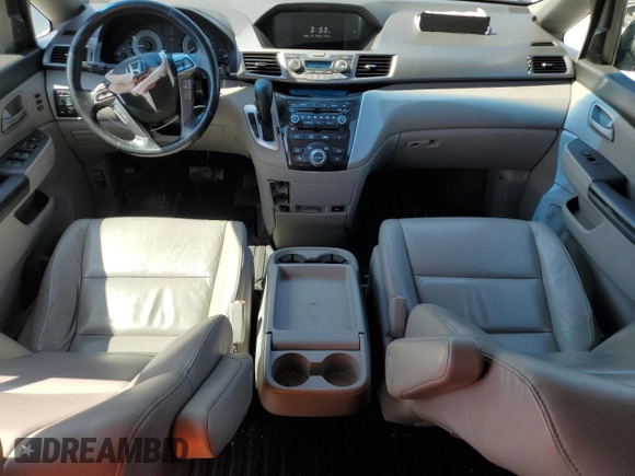 2011 Honda Odyssey Touring with VIN 5FNRL5H97BB501213, listed as a Copart auction lot 57314115 with 283,538 mi miles and Salvage title. Bid and sale history available at DreamBid. Image 8.