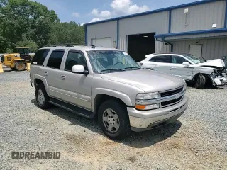 2004 Chevrolet Tahoe LT with VIN 1GNEC13Z84R196100, listed as a Copart auction lot 62810484 with 220,759 mi miles and Salvage Title. Bid and sale history available at carsss.com. Image 12.