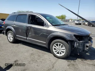 2017 Dodge Journey SXT with VIN 3C4PDCBB5HT701487, listed as a Copart auction lot 58821045 with 118,585 mi miles and Salvage title. Bid and sale history available at DreamBid. Image 4.