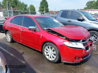 2012 Lincoln MKZ with VIN 3LNHL2GC9CR820700, listed as a IAAI auction lot 40129272 with 166,084 mi miles. Bid and sale history available at carsss.com. Image 1.