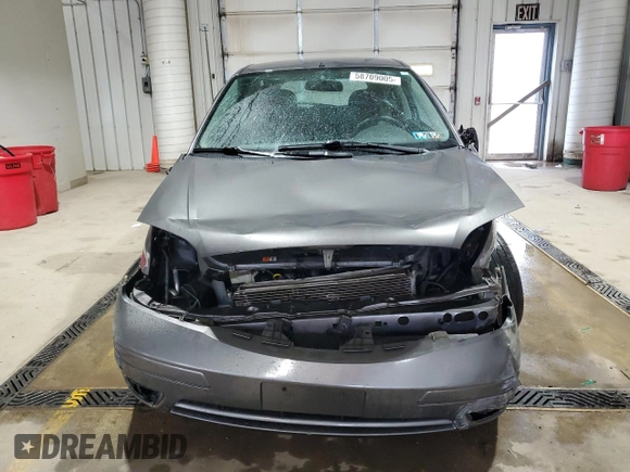 2007 Ford Focus S с VIN 1FAFP31N67W259641, выставлен на аукционе Copart как лот 58709005 с пробегом 140 109 миль миль и Списание • Salvage title. История ставок и продаж доступна на DreamBid. Изображение 5.