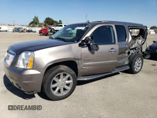2014 GMC Yukon XL Denali with VIN 1GKS2MEF1ER107346, listed as a Copart auction lot 67927133 with 77,793 mi miles and Salvage Title. Bid and sale history available at carsss.com. Image 1.