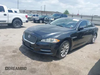 2013 Jaguar XJ with VIN SAJWA1C77D8V44610, listed as a IAAI auction lot 42150382 with Not Provided miles and . Bid and sale history available at DreamBid. Image 2.