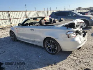 2013 BMW 1 Series 128i with VIN WBAUL7C53DVU09950, listed as a Copart auction lot 77703764 with 94,378 mi miles and Salvage title. Bid and sale history available at DreamBid. Image 2.