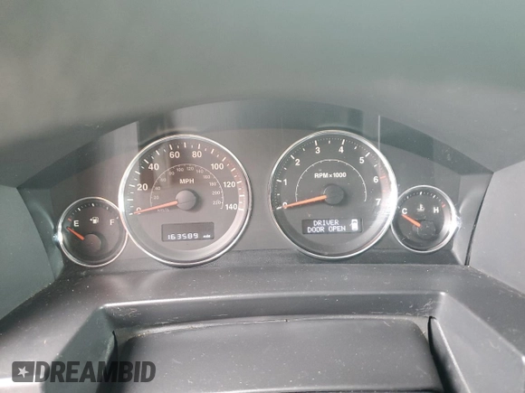 2008 Jeep Commander Sport with VIN 1J8HH48K18C229797, listed as a Copart auction lot 68807034 with 163,589 mi miles and Salvage title. Bid and sale history available at DreamBid. Image 9.