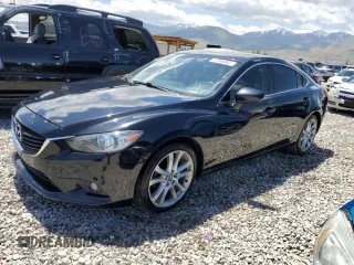 2014 Mazda 6 i Grand Touring с VIN JM1GJ1W61E1146244, выставлен на аукционе Copart как лот 57856365 с пробегом 152 194 миль миль и Списание • Salvage title. История ставок и продаж доступна на DreamBid. Изображение 1.