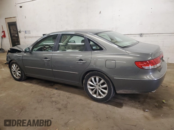 2007 Hyundai Azera SE z VIN KMHFC46FX7A183539, wystawiony jako Copart lot #54205265 z przebiegiem 154 942 mil mil oraz Nie do naprawy • Non repairable. Historia ofert i sprzedaży dostępna na DreamBid. Obrazek 2.