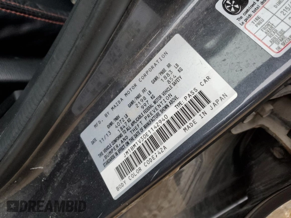 2014 Mazda 3 S Touring with VIN JM1BM1V30E1142940, listed as a Copart auction lot 82905173 with Not Provided miles and Salvage Title. Bid and sale history available at DreamBid. Image 12.
