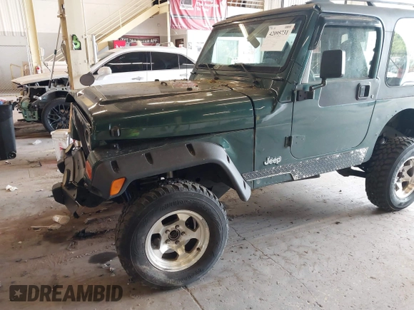 2000 Jeep Wrangler Sport with VIN 1J4FA49S8YP780104, listed as a IAAI auction lot 42095731 with Not provided miles and . Bid and sale history available at DreamBid. Image 6.