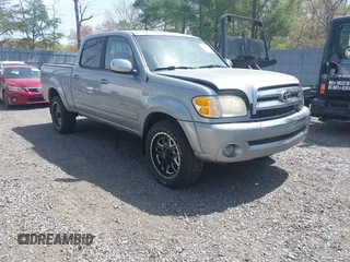 2004 Toyota Tundra SR5 with VIN 5TBDT44174S434897, listed as a IAAI auction lot 42128806 with 218,054 mi miles and . Bid and sale history available at DreamBid. Image 1.