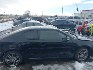 2013 Scion tC with VIN JTKJF5C72D3055801, listed as a IAAI auction lot 41102753 with 242,146 mi miles. Bid and sale history available at carsss.com. Image 13.