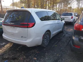 2023 Chrysler Pacifica Hybrid Limited with VIN 2C4RC1S73PR626236, listed as a IAAI auction lot 41696687 with 42,590 mi miles. Bid and sale history available at carsss.com. Image 4.