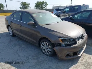 2014 Volkswagen Jetta SE with VIN 3VWD17AJ7EM385606, listed as a IAAI auction lot 42575046 with 86,889 mi miles and . Bid and sale history available at DreamBid. Image 1.