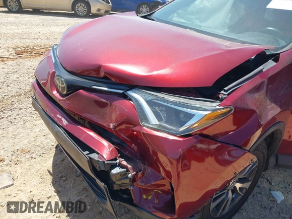 2018 Toyota RAV4 XLE with VIN 2T3WFREVXJW434957, listed as a IAAI auction lot 42002561 with 111,590 mi miles and . Bid and sale history available at carsss.com. Image 6.
