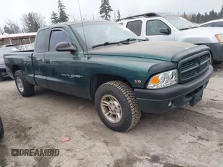 2000 Dodge Dakota Sport with VIN 1B7GL22N6YS764185, listed as a IAAI auction lot 41570275 with 157,334 mi miles. Bid and sale history available at carsss.com. Image 1.