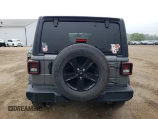 2020 Jeep Wrangler Unlimited Sport Altitude with VIN 1C4HJXDG2LW314301, listed as a Copart auction lot 59857615 with 60,684 mi miles and Salvage title. Bid and sale history available at DreamBid. Image 6.