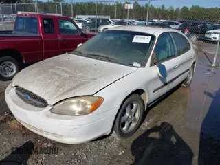 2000 Ford Taurus SE with VIN 1FAFP53U3YA244156, listed as a IAAI auction lot 41204116 with 125,694 mi miles and . Bid and sale history available at DreamBid. Image 2.