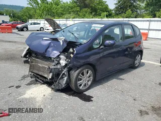 2009 Honda Fit Sport z VIN JHMGE88489S023368, wystawiony jako Copart lot #59741195 z przebiegiem 153 384 mil mil oraz Szkoda całkowita • Salvage title. Historia ofert i sprzedaży dostępna na DreamBid. Obrazek 1.