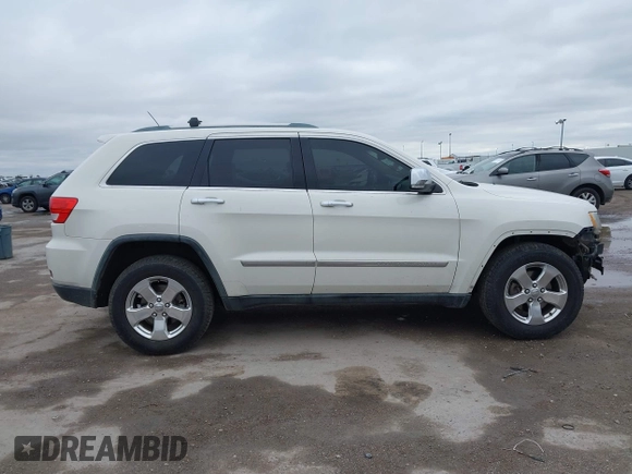 2012 Jeep Grand Cherokee Limited with VIN 1C4RJEBG4CC229571, listed as a IAAI auction lot 41565669 with 221,268 mi miles. Bid and sale history available at carsss.com. Image 13.