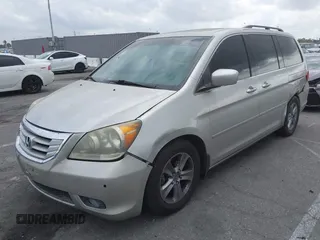 2008 Honda Odyssey Touring with VIN 5FNRL38908B058867, listed as a IAAI auction lot 42126471 with 201,088 mi miles and . Bid and sale history available at DreamBid. Image 2.