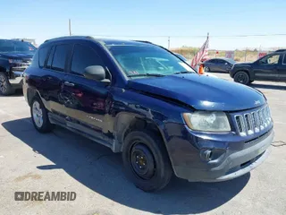 2014 Jeep Compass Sport with VIN 1C4NJCBB2ED737297, listed as a IAAI auction lot 42056598 with 185,155 mi miles. Bid and sale history available at carsss.com. Image 1.