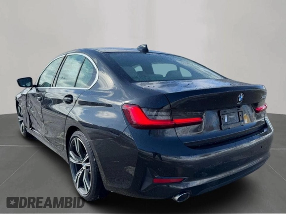 2021 BMW 3 Series 330i with VIN 3MW5R1J04MBB48483, listed as a Copart auction lot 50515195 with 128,555 mi miles and Clean Title. Bid and sale history available at carsss.com. Image 3.