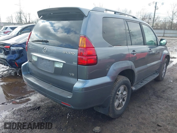 2003 Lexus GX with VIN JTJBT20X830006106, listed as a IAAI auction lot 41520749 with 264,413 mi miles. Bid and sale history available at carsss.com. Image 4.