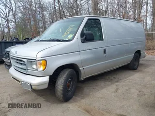 2001 Ford Econoline Cargo with VIN 1FTRE14281HA44065, listed as a IAAI auction lot 41828491 with 116,086 mi miles. Bid and sale history available at carsss.com. Image 2.