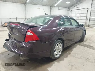 2011 Ford Fusion SE with VIN 3FAHP0HAXBR308930, listed as a IAAI auction lot 42028352 with 116,116 mi miles. Bid and sale history available at carsss.com. Image 4.
