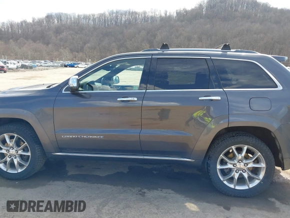 2014 Jeep Grand Cherokee Summit with VIN 1C4RJFJM5EC377129, listed as a IAAI auction lot 41763932 with 187,561 mi miles and . Bid and sale history available at DreamBid. Image 14.