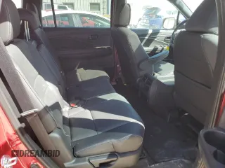 2023 Honda Passport EX-L with VIN 5FNYF8H57PB007264, listed as a Copart auction lot 48942955 with 18,013 mi miles and Salvage Title. Bid and sale history available at DreamBid. Image 11.