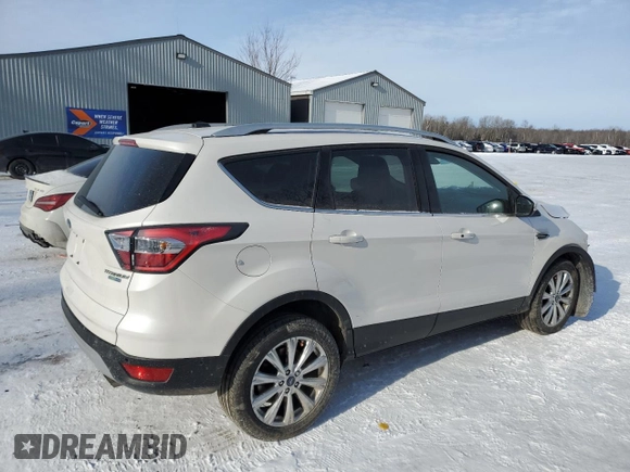 2017 Ford Escape Titanium with VIN 1FMCU9J9XHUA01661, listed as a Copart auction lot 88345395 with 79,865 mi miles and Salvage Title. Bid and sale history available at carsss.com. Image 3.