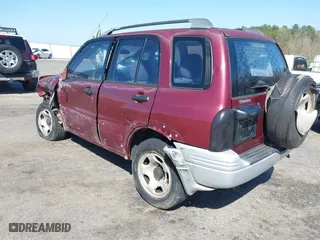 2000 Suzuki Grand Vitara with VIN JS3TE62V5Y4102944, listed as a IAAI auction lot 41782009 with 179,765 mi miles. Bid and sale history available at carsss.com. Image 3.