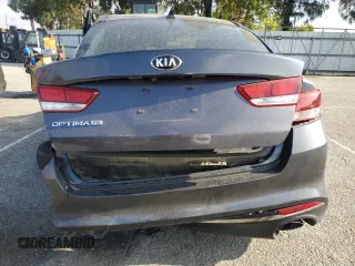 2016 Kia Optima LX z VIN KNAGT4L36G5113156, wystawiony jako Copart lot #55999935 z przebiegiem 88 647 mil mil oraz Szkoda całkowita • Salvage title. Historia ofert i sprzedaży dostępna na DreamBid. Obrazek 6.