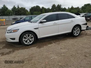 2012 Ford Taurus SEL z VIN 1FAHP2EW8CG138653, wystawiony jako Copart lot #56750215 z przebiegiem 159 631 mil mil oraz Szkoda całkowita • Salvage title. Historia ofert i sprzedaży dostępna na DreamBid. Obrazek 1.